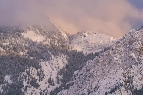 Snow-capped Wasatch Mountains at sunset